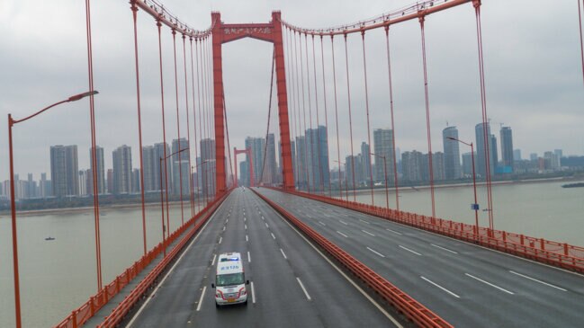 China Virus Epicenter’s Streets Deserted as Hospitals Struggle to Cope