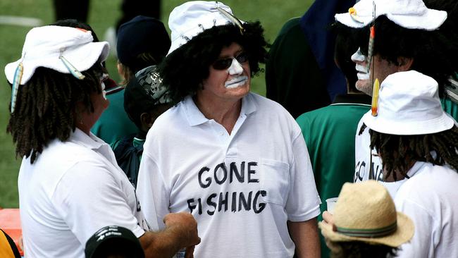 Some cricket fans at Marrara at the second ODI after Symonds was kicked off the tour for going fishing. Picture: AFP PHOTO / Greg WOOD