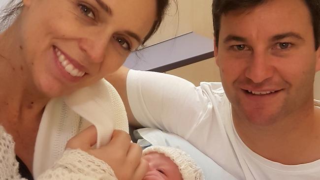 Jacinda Ardern and her partner Clarke Gayford smile s they pose for a photo with their newborn. (Photo: Office of the Prime Minister of New Zealand