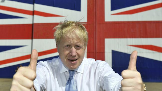 FILE - In this Thursday, June 27, 2019 file photo Conservative leadership candidate Boris Johnson gives the thumbs at the Wight Shipyard Company at Venture Quay during a visit to the Isle of Wight, England. (Dominic Lipinski/Pool Photo via AP, File)