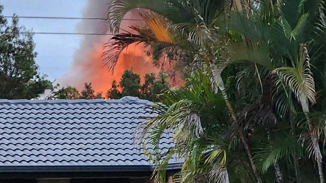 A family has fled a house fire at Tenah Merah where seven fire crews were dispatched to try and battle the blaze. Photo: Rosin Coogan