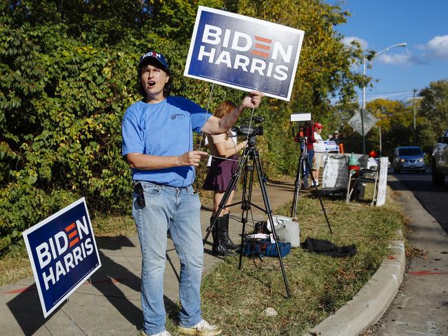 Karen Young, 55, yells pro-Biden slogans outside Belmont University where the final US Presidential Debate was held. Picture: Angus Mordant for News Corp Australia