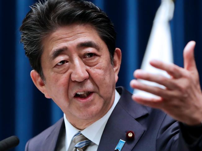 Japan's Prime Minister Shinzo Abe speaks during a press conference in Tokyo on December 9, 2019. (Photo by STR / JIJI PRESS / AFP) / Japan OUT