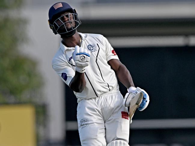 Carlos Maynard celebrates his hundred for PEGS. Picture: Andy Brownbill