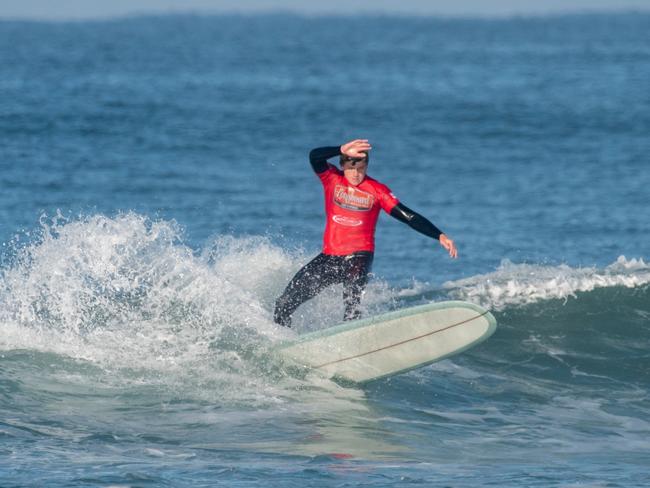 CARVING: Evans Head surfer Sam Ticknor's grace under pressure saw him emerge as the dominant surfer in the Men's Open Longboarding division at the Port Stephens Surf Festival on Thursday April 29, 2021 with a respectable two-wave total of 12.74. Photo: Ethan Smith / Surfing NSW