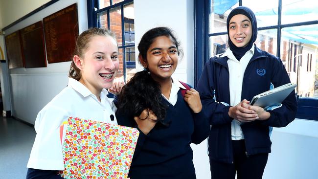 Students Mieke van Wel, 14, Shivani Kadiyala, 14, and Ayat Qabha, 14, at Canterbury Girls High School in Sydney yesterday. Picture: Hollie Adams