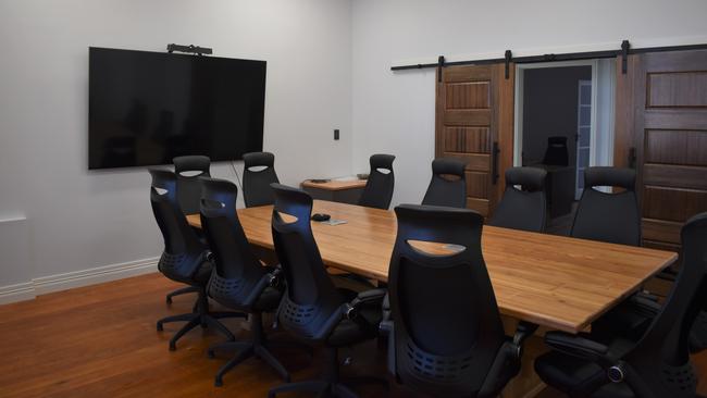 The main boardroom for hire has arch windows overlooking East Street.