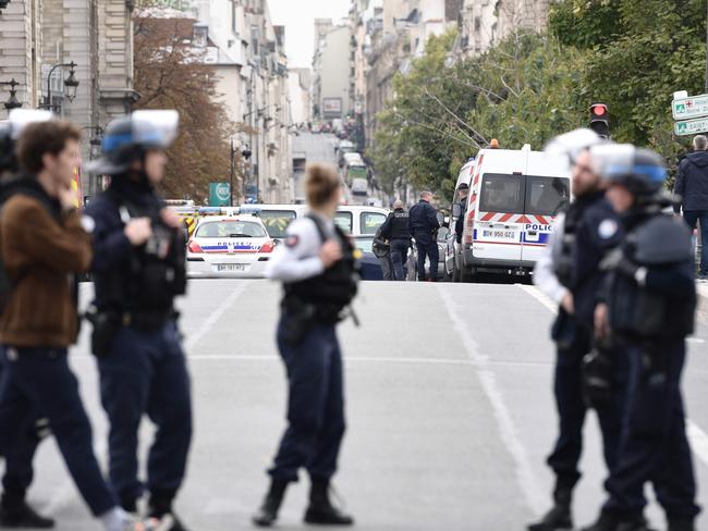 Police block the street near Paris prefecture de police (police headquarters) after a knife attacker went on a rampage. Picture: AFP