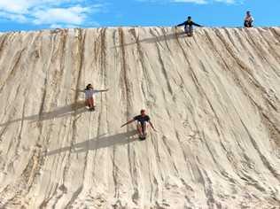 Sandboarding fun at Anna Bay. Picture: Contributed