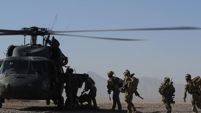 Australian troops board a Black Hawk Helicopter at their Tarin Kowt base for an offensive in Kandahar province in southern Afghanistan. Picture: Department of Defence