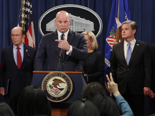 WASHINGTON, DC - JANUARY 28: (L-R) U.S. Commerce Secretary Wilbur Ross, acting Attorney General Matthew Whitaker, Homeland Security Secretary Kirstjen Nielsen, Federal Bureau of Investigation Director Christopher Wray and U.S. Attorney Richard Donoghue of the Eastern District of New York announce new criminal charges against Chinese telecommunications giant Huawei at the Department of Justice January 28, 2019 in Washington, DC. The Justice Department is charging Huawei and its American affiliate with theft of trade secrets, wire fraud, and obstruction of justice. The recent arrest of Huawei CFO Meng Wanzhou in Canada has strained relations between the United States and China as the Trump administration seeks to have her extradited to the U.S.   Chip Somodevilla/Getty Images/AFP == FOR NEWSPAPERS, INTERNET, TELCOS & TELEVISION USE ONLY ==