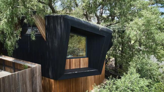 This one-of-a-kind eco-house enjoys uninterrupted views of Mount Kembla. Picture: Airbnb