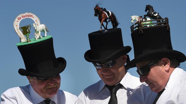 David Krause, Dallad Clark and Ezy Ransley from Hobart. 2015 Melbourne Cup Day colour at Flemington racecourse, Melbourne. CupColour15 Picture: Nicole Garmston