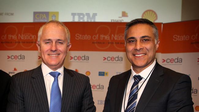 Former Australia Post CEO Ahmed Fahour and then communications minister Malcolm Turnbull in 2014. Picture: Kym Smith