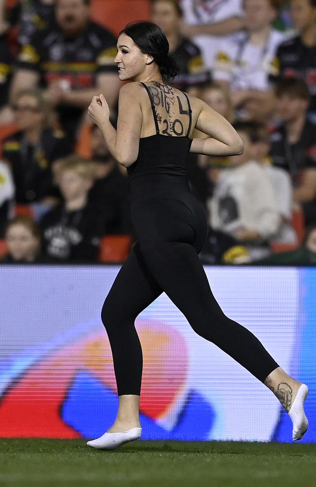 The first pitch invader of the night at BlueBet Stadium. Picture: NRL Imagery