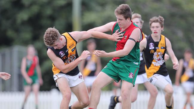 There were some great tussles off the ball on grand final day. Pic Peter Wallis