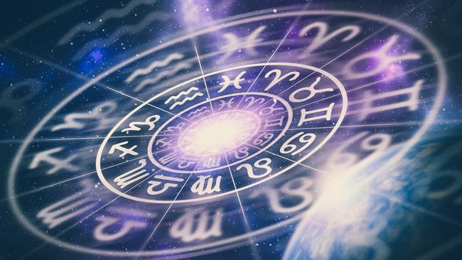 Astrological zodiac signs inside of horoscope circle on universe background - astrology and horoscopes concept