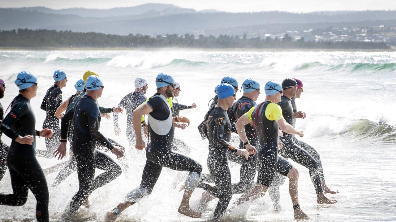 Seven Mile Beach Gala Day Triathlon, start of the Olympic race. Picture: Chris Kidd