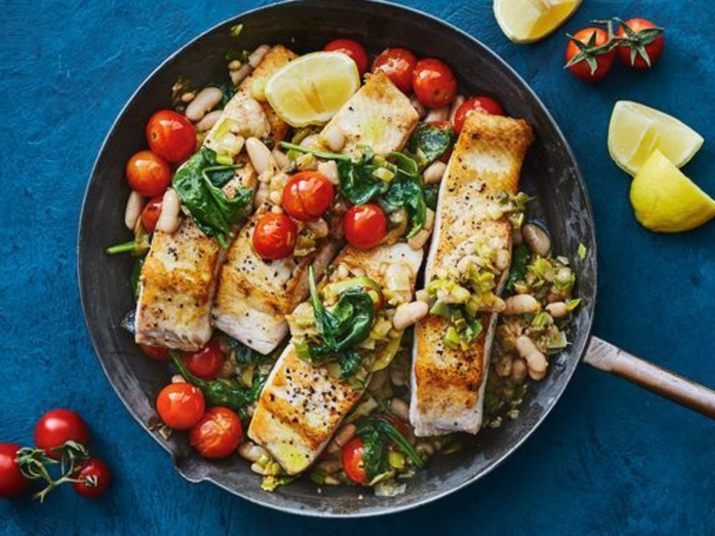 Fish with beans and tomatoes.