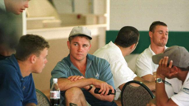 Captain of Gold Coast Chargers Jamie Goddard with teammates after hearing the bad news the club had been axed.