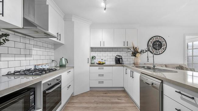 The kitchen features plenty of storage, stainless-steel appliances, a 900mm gas oven and cooktop, stone benchtops and a spacious pantry. Ms Tantaro has upgraded the kitchen since moving in about two years ago.