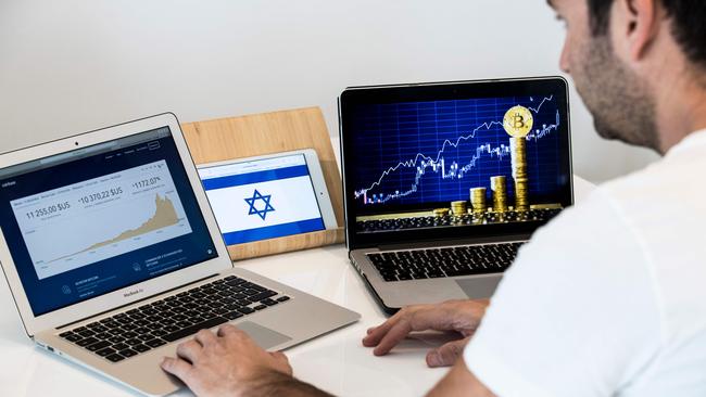 An Israeli consultant in Tel Aviv trades bitcoin online.