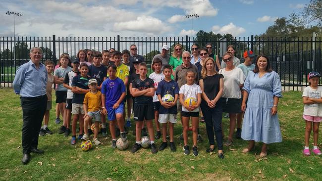 Angry kids, parents and councillors outside the locked pitch in Canada Bay. Picture: Supplied