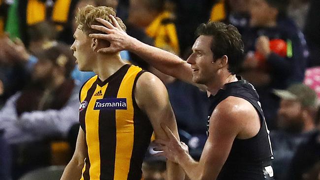 Jed Lamb gives James Sicily a rub on the head. Pic: Michael Klein