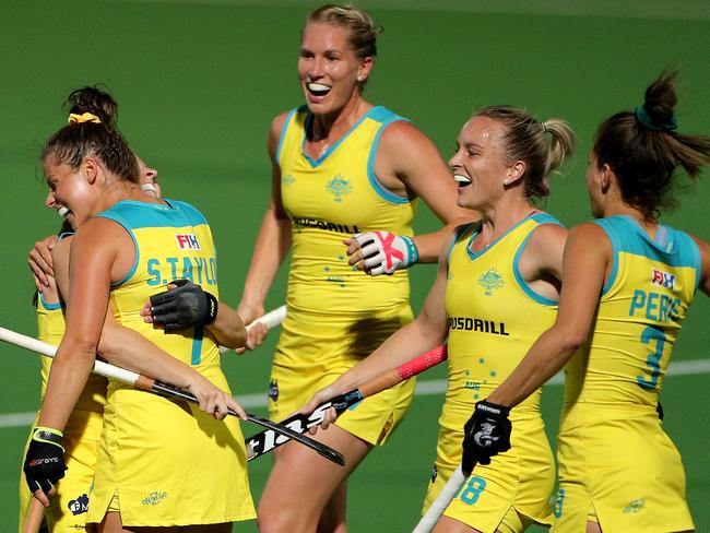 Hockeyroos players celebrate a goal by Sophie Taylor during Olympic Qualifying Match 2 between Australia and Russia at Perth Hockey Stadium in Perth, Saturday, October 26, 2019.  (AAP Image/Richard Wainwright) NO ARCHIVING, EDITORIAL USE ONLY