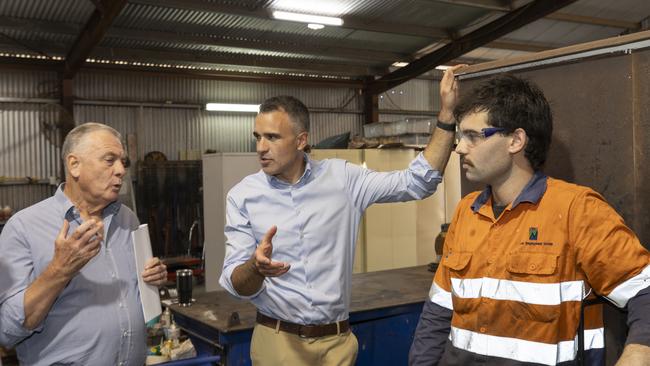 Whyalla Hose &amp; Fittings Services director David Bruce with SA Premier Peter Malinauskas and supervisor Luke Spry. Picture: Brett Hartwig