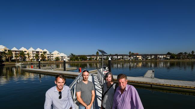 Local residents Cameron Howe, Oliver Agius, Jeannette Shone and Maurie Thomas at the temporary new public jetty in Patterson Lakes. PICTURE: PENNY STEPHENS