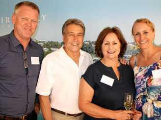 Todd McKee, left, and Sharni Pinder, right, of McGrath Estate Agents with Mel and Gill Luke at Mooloolaba to celebrate the launch of the luxury First Bay Coolum development. Picture: Erle Levey