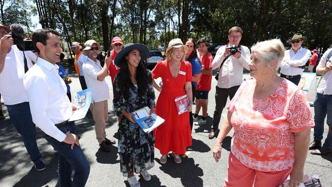 Leader of the Opposition David Crisafulli handing out how to vote cards with LNP candidate for Pumicestone Ariana Doolan, alongside Labor MP Ali King on Bribie Island on Friday afternoon. Picture: Liam Kidston