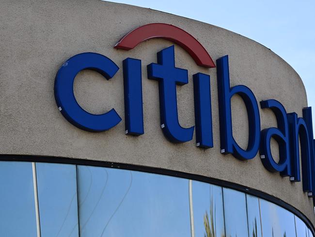 (FILES) Signage is displayed outside of a Citigroup Citibank branch in Torrance, California, on March 13, 2023. JPMorgan Chase and Citigroup reported increased second-quarter profits on July 12, 2024, despite somewhat higher costs to account for bad loans in light of greater stress on lower-income customers. At Citi, second-quarter profits were $3.2 billion, up 10 percent from the year-ago period, reflecting the benefit of a six percent drop in operating expenses following a reorganization directed by CEO Jane Fraser. (Photo by Patrick T. Fallon / AFP)