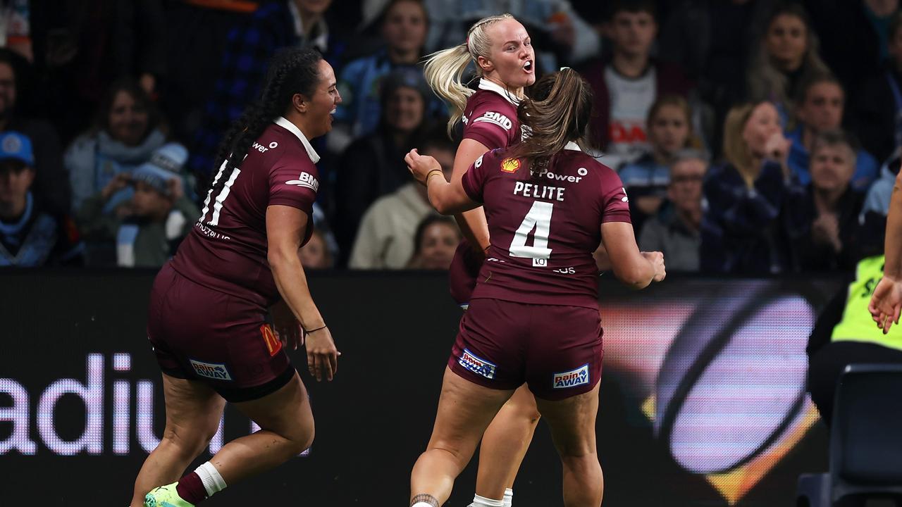 Emily Bass of the Maroons celebrates scoring a try during game one of the Women's State of Origin series between New South Wales and Queensland. Picture: Getty Images