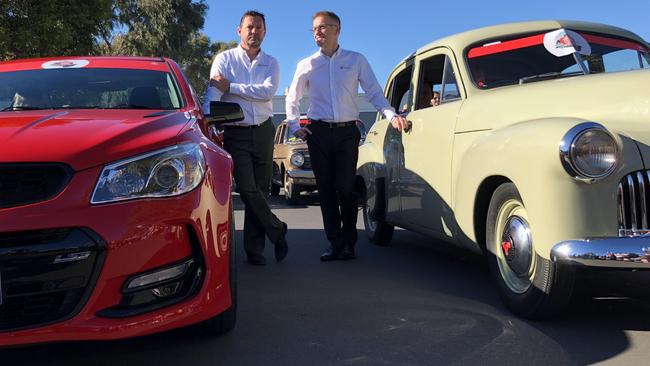 Holden managing director Mark Bernhard (left) with the head of Holden manufacturing Richard Phillips (right) at the Holden Dream Cruise in the lead-up to the factory shutdown. Photo: Joshua Dowling.