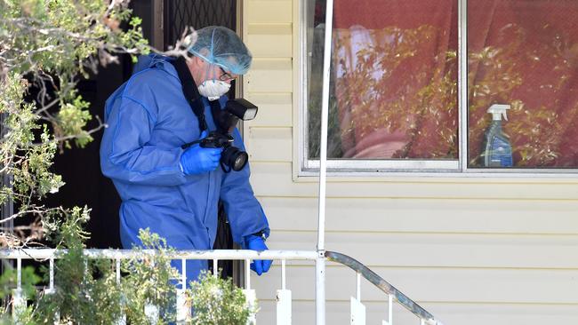 Police at the Cannon Hill home where Khalil Ibrahim died in October last year. Picture: John Gass