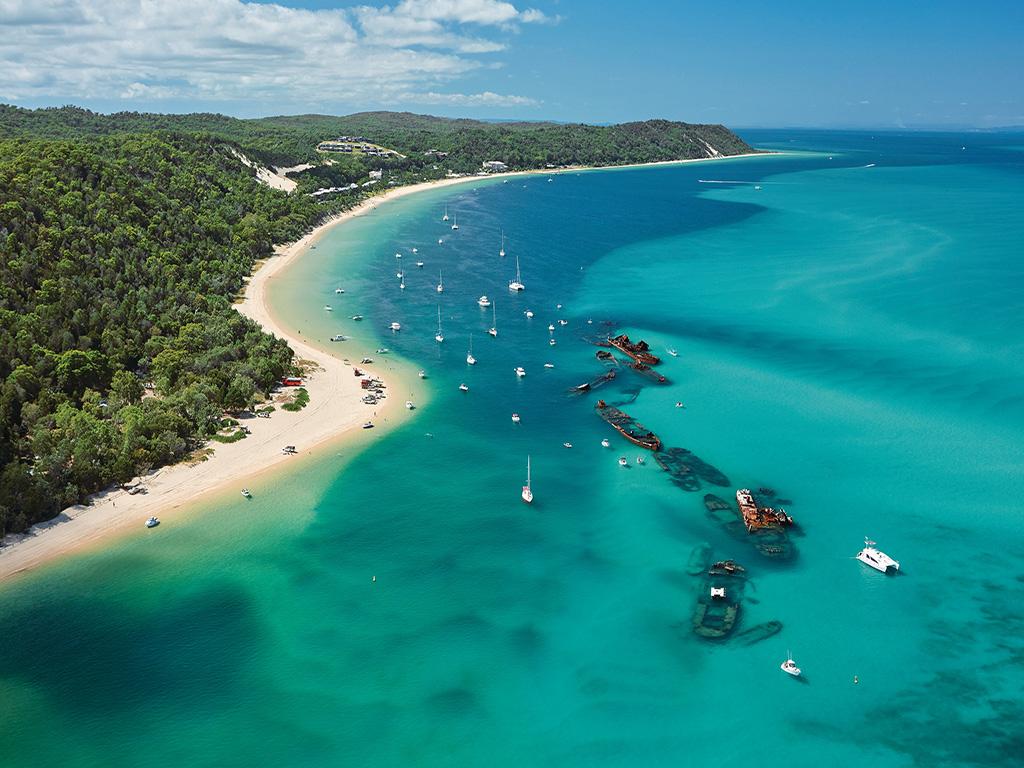 <span>5/21</span><h2>See marine life at Tangalooma Island Resort</h2><p> Hop on a ferry from Pinkenba and travel just over an hour from Brisbane to Moreton Island and the untouched marine parks of <a href="http://www.visitmoretonbayregion.com.au/" target="_blank">Moreton Bay</a>. Here lies <a href="https://www.tangalooma.com/" target="_blank">Tangalooma Island Resort</a>, one of the few places in the world where you’ll be able to snorkel shipwrecks and hand-feed dolphins all in the same day. Picture: Tourism and Events Queensland</p>