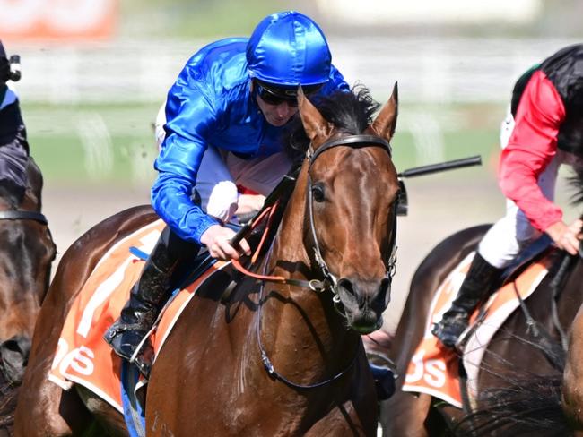 MELBOURNE, AUSTRALIA - OCTOBER 08: James McDonald riding Anamoe defeats I'm Thunderstruck and Zaaki in Race 7, the Neds Might And Power, during Caulfield Guineas Day at Caulfield Racecourse on October 08, 2022 in Melbourne, Australia. (Photo by Vince Caligiuri/Getty Images)