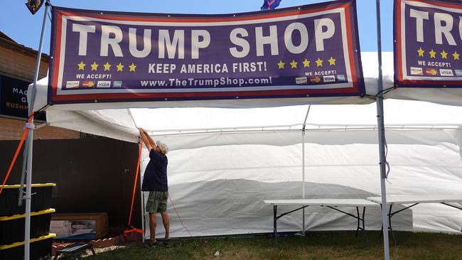 A vendor sets up a stand to sell Trump merchandise near Mount Rushmore. Picture: AFP