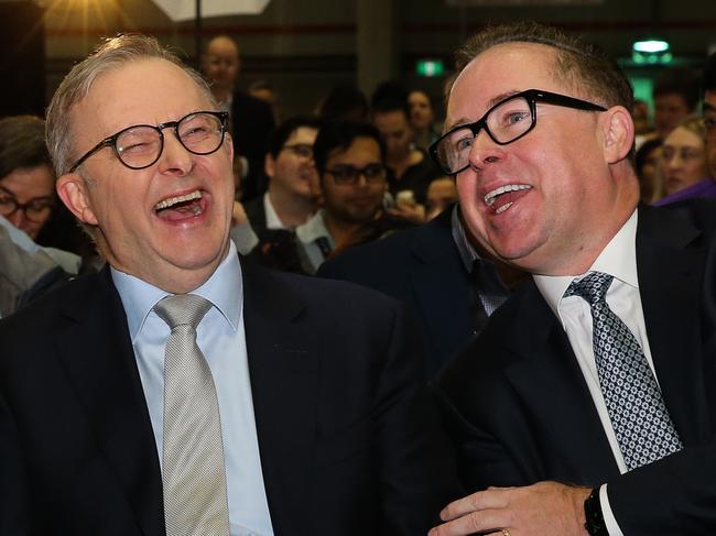 SYDNEY, AUSTRALIA  - AUGUST 14 2023: Former Australian rules football player  Adam Goodes, Prime Minister, Anthony Albanese and Qantas CEO Alan Joyce attend the launch of the Qantas 'Yes' Campaign where The Prime Minister will deliver a speech. Picture: NCA Newswire / Gaye Gerard