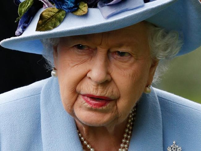 (FILE PIC) Britain's Queen Elizabeth II attends on day one of the Royal Ascot horse racing meet, in Ascot, west of London, on June 18, 2019. - The five-day meeting is one of the highlights of the horse racing calendar. Horse racing has been held at the famous Berkshire course since 1711 and tradition is a hallmark of the meeting. Top hats and tails remain compulsory in parts of the course while a daily procession of horse-drawn carriages brings the Queen to the course. (Photo by Adrian DENNIS / AFP)