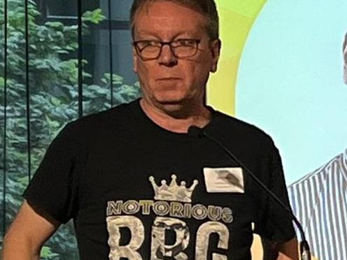 Department Secretary Jim Betts gave a supply chain keynote in Brisbane wearing a Notorious RBG t-shirt, a reference to former U.S Supreme Court Justice Ruth Bader Ginsburg.