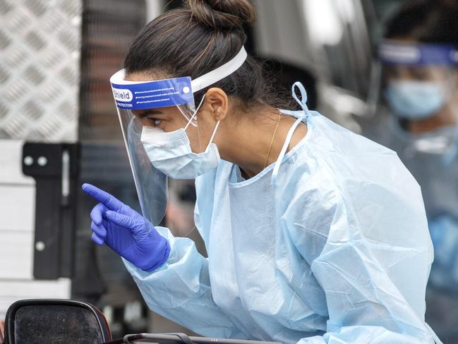 MELBOURNE, AUSTRALIA - NewsWire Photos FEBRUARY 15, 2021: DHHS staff conduct Covid tests at Darebin Arts Centre on Monday morning during stage 4 lockdown across Victoria. Picture: NCA NewsWire / David Geraghty