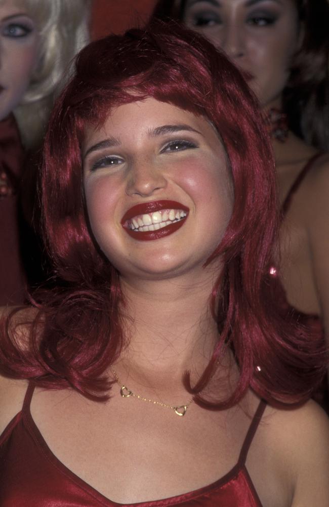 A 14-year-old Ivanka Trump dressed up with mum Ivanka in a red wig for a gala event in 1995. Picture: Ron Galella/WireImage