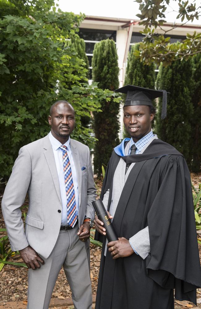 John Diing congratulates Bachelor of Human Services graduate Ezekiel Aleer at a UniSQ graduation ceremony at Empire Theatres, Tuesday, February 13, 2024. Picture: Kevin Farmer