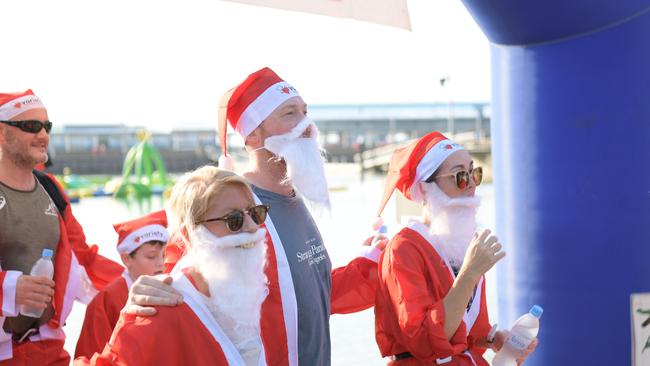 Runners finish the Variety Santa Fun Run. Picture: (A)manda Parkinson