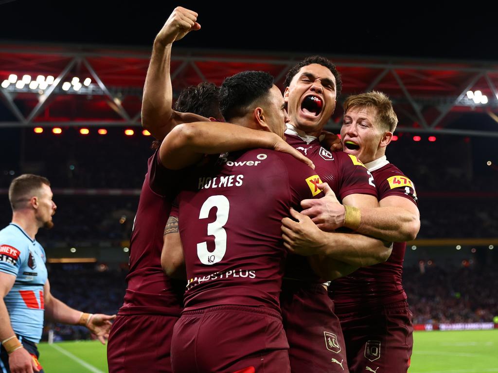 The Queensland Maroons celebrate a try during State of Origin Game Two at Suncorp Stadium.