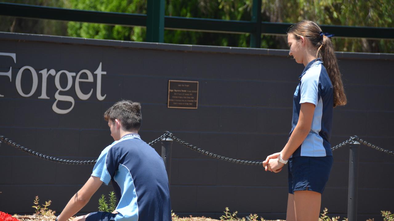 Kingaroy State School students lay a wreath during the 2019 Kingaroy Remembrance Day service at KSHS. (Photo: Jessica McGrath)