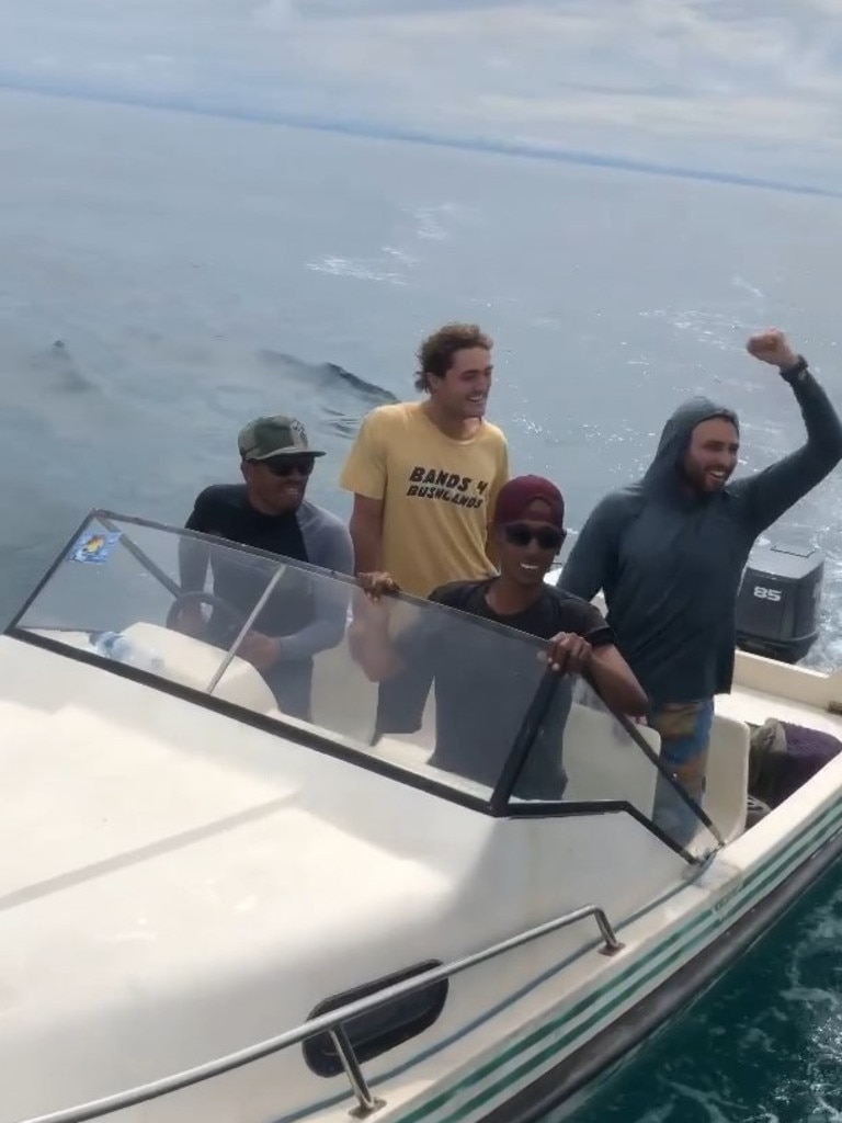 Elliot Foote (top right) seen during his rescue.